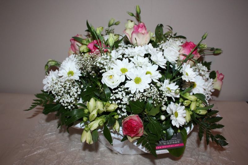 Coussin rond blanc et rose